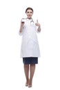 in full growth. female doctor showing her visiting card. Royalty Free Stock Photo