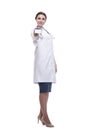 in full growth. female doctor showing her visiting card. Royalty Free Stock Photo