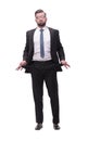 In full growth. frustrated businessman showing his empty pockets Royalty Free Stock Photo