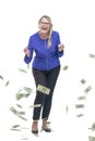 In full growth. happy elderly woman with dollar bills.