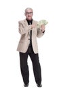 in full growth. happy intelligent man with banknotes. Royalty Free Stock Photo