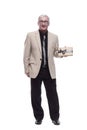 in full growth. Mature intelligent man with a gift box. Royalty Free Stock Photo