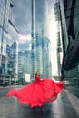 Full growth portrait of fashionable woman on urban background