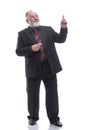 Senior businessman pointing to a white blank screen. Royalty Free Stock Photo