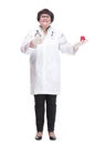 in full growth. senior female doctor showing her visiting card Royalty Free Stock Photo