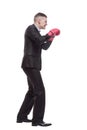 in full growth. young businessman in Boxing gloves. Royalty Free Stock Photo