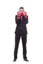 in full growth. young businessman in Boxing gloves. Royalty Free Stock Photo