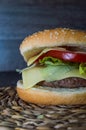 Full hamburguer on rustic background