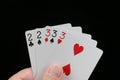 Full House poker hand. Royalty Free Stock Photo