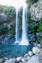 Full Joengbang waterfall with blue pool in Seogwipo, Jeju Island, South Korea