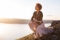 full of joyful feeling satisfaction for beautiful blonde young woman playing alone the acoustic guitar ukulele with the Royalty Free Stock Photo