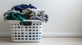 The basket of laundry clothes. AI generated Royalty Free Stock Photo