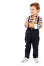 Full lenght portrait of an adorable little boy showing thumbs up Royalty Free Stock Photo