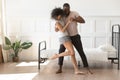 African couple in love holding hands dancing in morning indoors Royalty Free Stock Photo