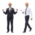 Full-length .architect in orange helmet with drawings for new project. Royalty Free Stock Photo