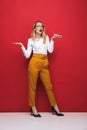 Full length of a beautiful young blonde woman Royalty Free Stock Photo