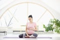 Pregnan woman in yoga pose