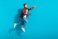 Full length body photo of funny jumping energetic sportive man brutal beard look friendly hugs welcome isolated on blue