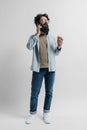 Full length body portrait of a handsome hipster man Royalty Free Stock Photo
