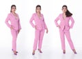 Full length body portrait of 20s Asian Business Woman wear Pink suit blazzer shoes. Tanned skin Royalty Free Stock Photo