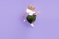 Full length body size girl jumping up running on sale casual clothes isolated pastel purple color background