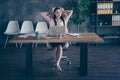 Full length body size photo of cheerful smiling proud business lady looking away dreaming of promotion sitting at her Royalty Free Stock Photo