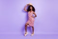 Full length body size photo curious dreamy woman wearing headwear printed dress looking copyspace isolated pastel purple