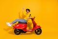 Full length body size photo of girl laying on scooter showing v-sign peace  bright yellow color background Royalty Free Stock Photo