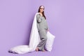 Full length body size photo of girl wearing pajama sleeping mask keeping pillow blanket isolated pastel purple color