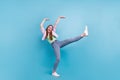 Full length body size photo overjoyed girl dancing in sunglass on weekend isolated pastel blue color background