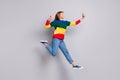 Full length body size photo of pretty girl jumping taking selfie showing v-sign gesture isolated on pastel grey color Royalty Free Stock Photo