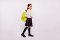 Full length body size profile side view portrait of her she nice attractive cheerful cheery pre-teen girl going walking Royalty Free Stock Photo