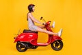 Full length body size side photo woman riding bike in dress helmet playful crazy isolated bright yellow color background