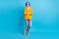 Full length body size view of attractive cheerful content woman posing folded arms isolated over vivid blue color Royalty Free Stock Photo