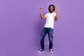 Full length body size view of attractive cheerful guy showing horn sign fooling isolated over bright violet purple color