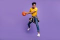 Full length body size view of attractive energetic motivated guy jumping playing game isolated over violet purple color