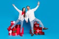 Full length body size view of attractive funky cheerful couple dancing having fun winter day isolated over bright blue Royalty Free Stock Photo