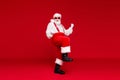 Full length body size view of handsome cheerful cheery funny bearded Santa dancing enjoying rest festal day celebratory