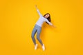 Full length body size view of her she attractive pretty overjoyed dreamy cheerful cheery girl jumping having fun dancing Royalty Free Stock Photo