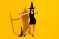 Full length body size view of her she nice attractive charming slender thin cheerful cheery lady wizard standing with Royalty Free Stock Photo