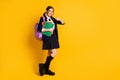 Full length body size view of her she nice attractive cheerful schoolgirl holding in hand subject learning book showing Royalty Free Stock Photo