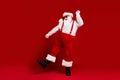 Full length body size view of his he attractive cheerful cheery carefree funny fat white-haired Santa dancing having fun