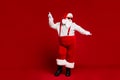 Full length body size view of his he attractive cool funny playful fat white-haired Santa having fun dancing rock day Royalty Free Stock Photo