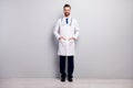 Full length body size view of his he nice attractive cheerful cheery professional doc excellent expert first aid service Royalty Free Stock Photo