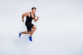 Full length body size view of his he nice attractive muscular focused purposeful guy jumping running jogging sprint