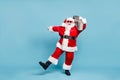 Full length body size view of his he nice cool fat cheerful cheery glad excited carefree bearded Santa clubber carrying Royalty Free Stock Photo