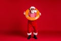 Full length body size view of his he nice handsome cheery funny bearded Santa father instructor wear sea ocean pool safe