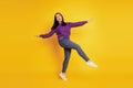 Full length body size view of nice attractive cheerful playful girl having fun fooling isolated on yellow color