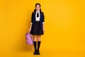 Full length body size view of nice attractive cheerful schoolgirl nerd holding in hand violet bag autumn fall season Royalty Free Stock Photo