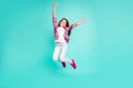 Full length body size view photo of lovely nice pretty little girl raise hands move movement enjoy free time weekend Royalty Free Stock Photo